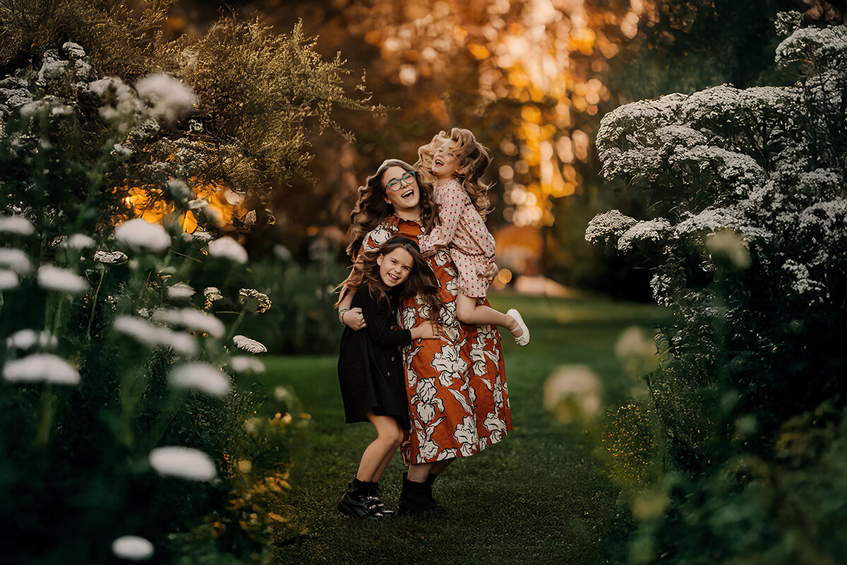 The Gauper family laughing together during a candid family photography session West Michigan